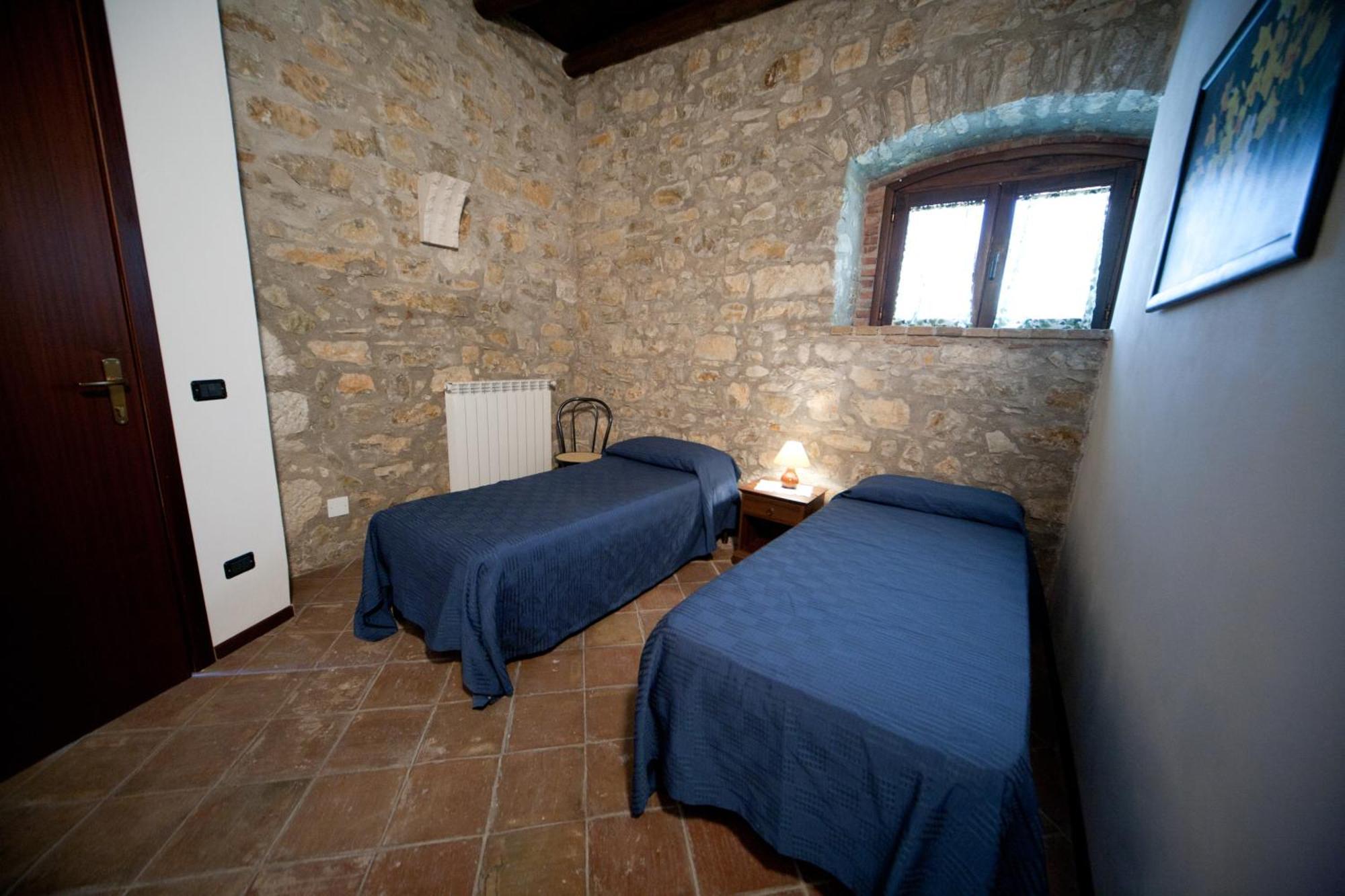 بيانا ديلي البانيسي Agriturismo Sant'Agata الغرفة الصورة